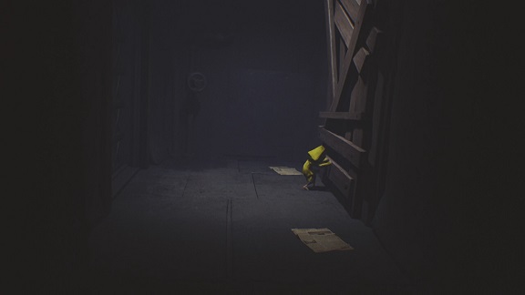 板でふさがれた扉